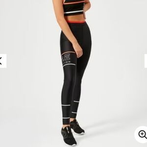 P.E Nation Women's The Glory Leggings - Black/Orange/White Medium Compression